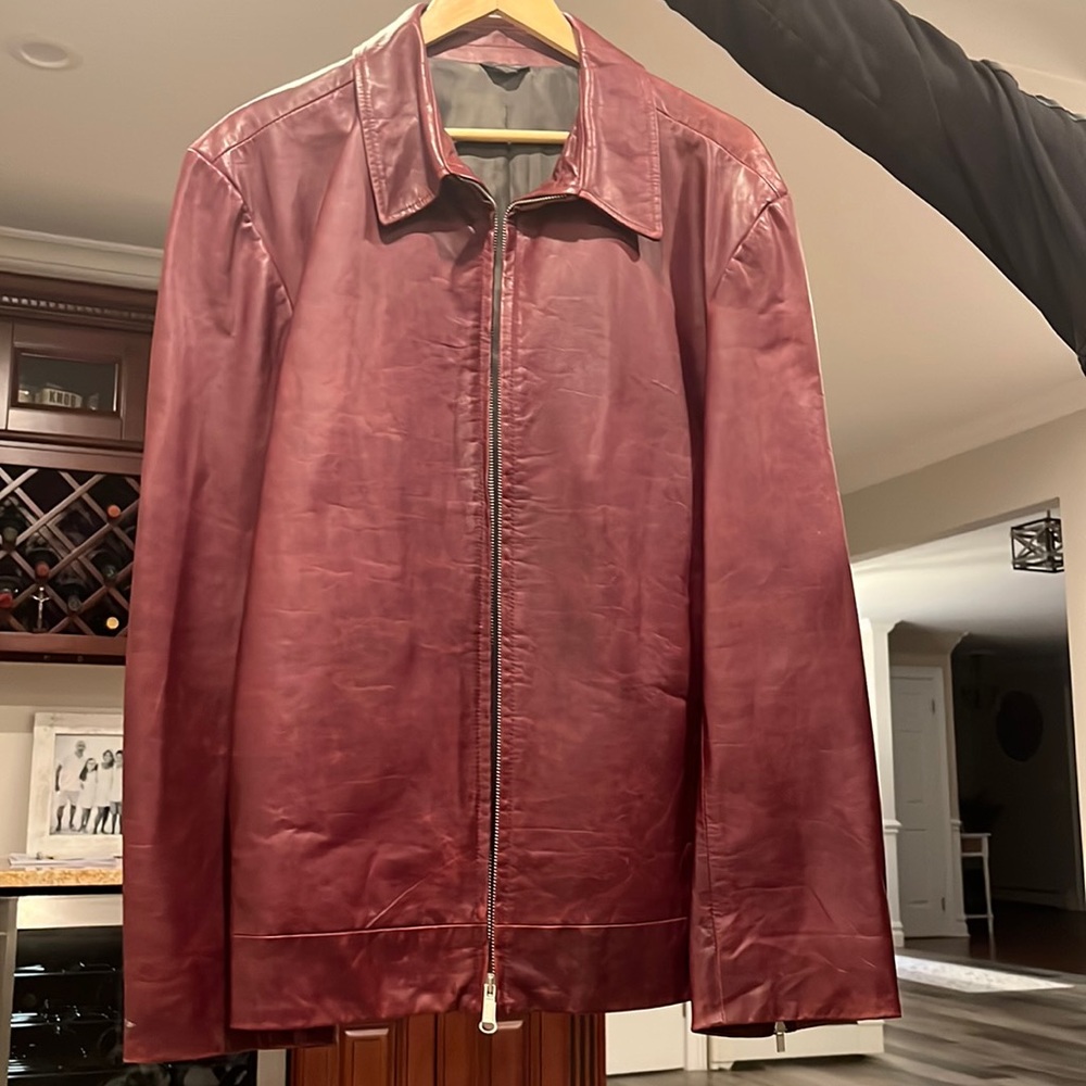 This is a burgundy, mens leather jacket from banana republic.